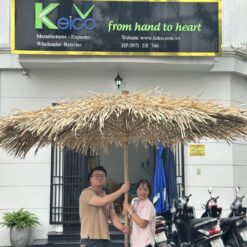 Alternative view of The Ultimate Natural Accent: Tropiccal Palm Leaf Parasol with Rustic Bamboo Pole (Perfect for Beaches & Gardens)